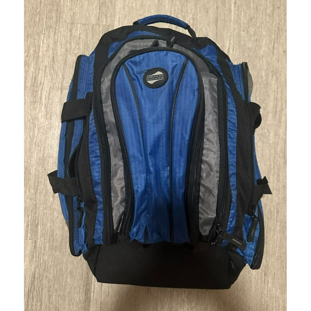 American Tourister Rolling Travel/Carry On Blue Backpack